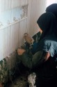 Weavers working on a vertical loom using a knot plan, Kerman, Iran, Photo by: May H. Beattie, 1970s. © Ashmolean Museum, University of Oxford