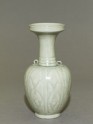 Greenware vase with floral decoration