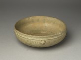 Greenware bowl with animal masks