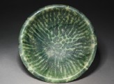 Bowl with splashed decoration in green