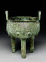 Ritual food vessel, or ding, with dragon and taotie masks