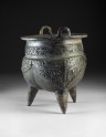Ritual food vessel, or li ding, with taotie masks