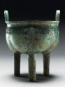 Ritual food vessel, or ding, with taotie masks