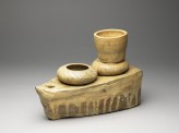 Greenware burial model of stove with cooking vessels (EA1956.940)