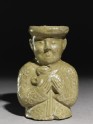 Greenware burial vessel section in the form of man holding a goat