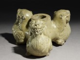 Greenware stand in the form of three lions