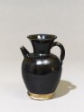 Black ware ewer with iron glaze