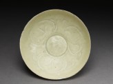 White ware bowl with stylized floral decoration