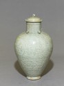 Greenware vase with lotus leaves