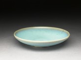 Shallow dish with blue glaze