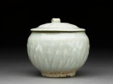 White ware jar with lotus leaf decoration