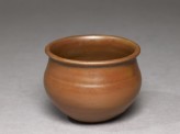 Ding type jar with russet iron glaze