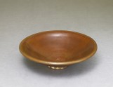 Ding type bowl with russet iron glaze