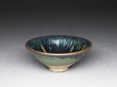 Black ware bowl with iron glazes