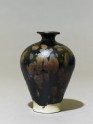 Black ware vase with 'partridge feather' glazes
