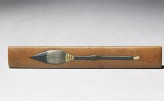 Kozuka, or knife handle, with calligraphy brush