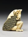 Netsuke in the form of a tengu mountain demon emerging from an egg