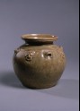 Greenware jar with four animal masks