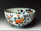 Bowl with chrysanthemum, peony, and peach sprays