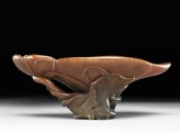 Rhinoceros horn libation cup in the form of a lotus (EA1957.94)