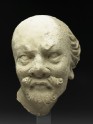 Stucco head of a man