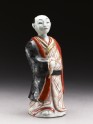 Figure of a man holding a fan (EA1960.10)