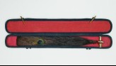 Box with peacock feather, probably used to denote official rank