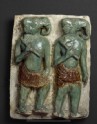 Plaque with elephant-headed warriors