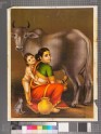 Mother and child milking the cow