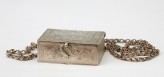 Hirz, or amulet case, containing inscribed paper (EA1966.77)