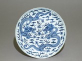 Blue-and-white dish with dragons chasing a flaming pearl