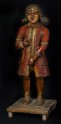 Figure of a standing Dutchman wearing a red coat (EA1968.42)