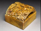 Soapstone seal with lioness with cubs