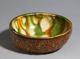 Bowl with floral decoration and three-colour glaze