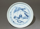 Blue-and-white dish with a figure in a landscape