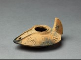 Oil lamp with vegetal scroll