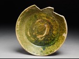 Fragment of a bowl with green glaze