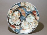 Dish with a shishi, or lion dog, amid animals and flowers (EA1976.50)