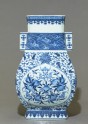 Blue-and-white vase with fruit and leaves