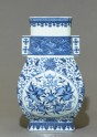 Blue-and-white vase with fruit and leaves