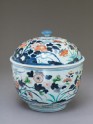 Tureen with peony and chrysanthemum growing from rocks