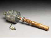 Prayer wheel containing a scroll