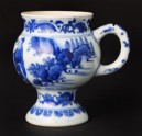 Blue-and-white mustard pot with figure and a horse