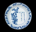 Blue-and-white dish with prunus tree and poem
