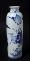 Blue-and-white vase with figures and deer in a landscape