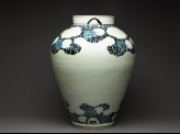 Jar with peony foliage and blossoms