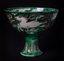 Stem cup with horses amid waves