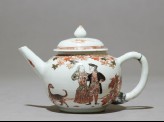 Teapot depicting a couple with a dog