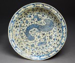 Dish with peacock and deer amid floral scrolls