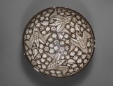 Bowl with flying phoenixes against a foliate background